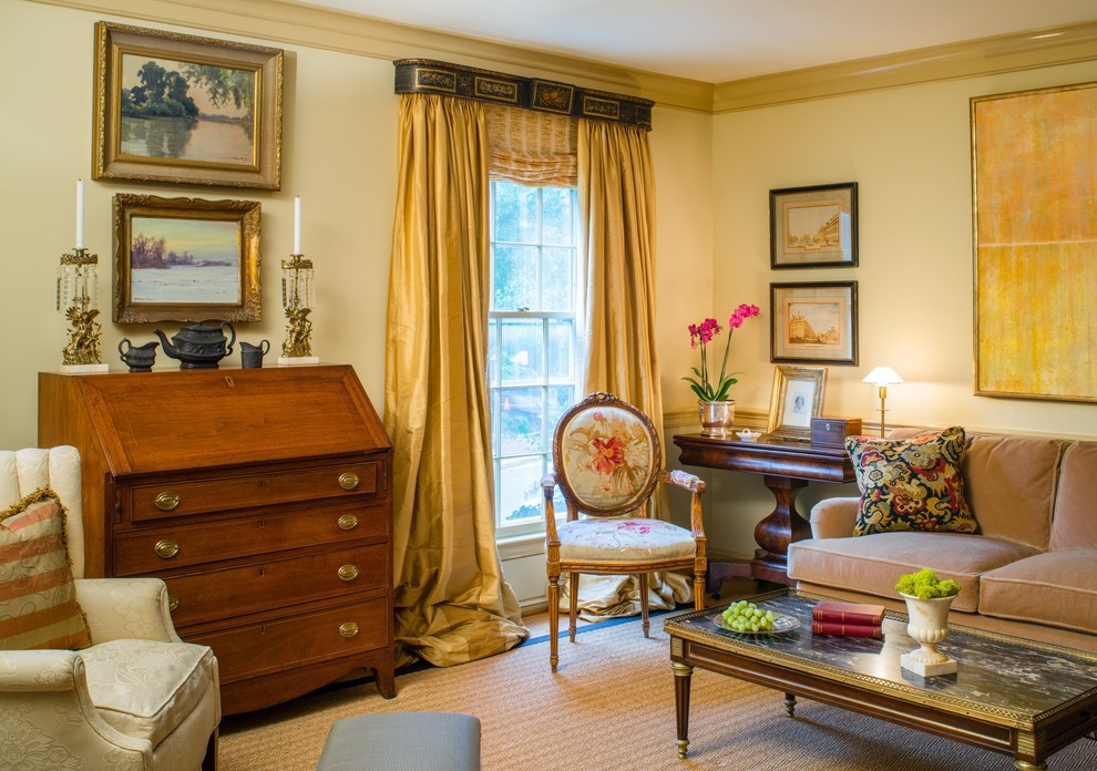 Photo of a traditional living room in DC Metro with beige walls.