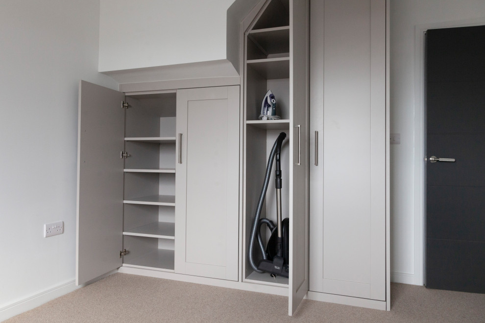 This is an example of a medium sized modern bedroom in Cardiff.