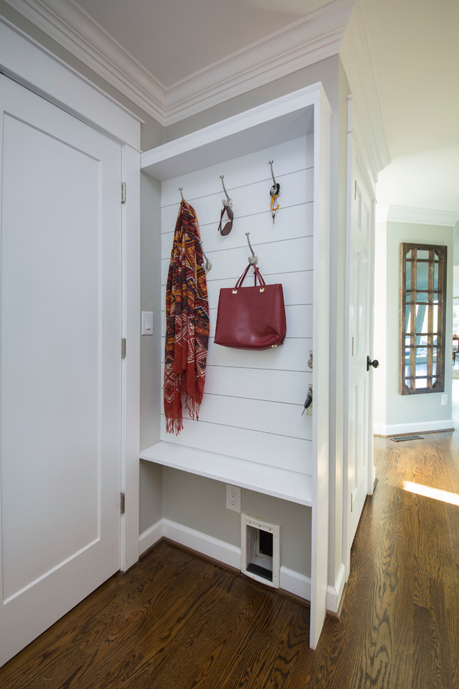 Small transitional mudroom in Other with grey walls and medium hardwood floors.