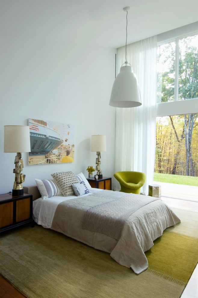 Inspiration for an eclectic bedroom in New York with white walls.