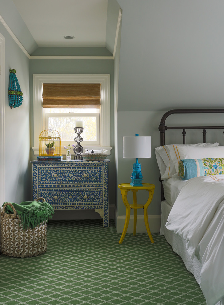 Design ideas for a mid-sized traditional guest bedroom in Boston with blue walls, carpet and green floor.