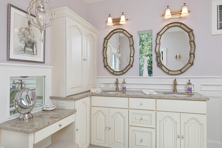 Photo of a large traditional master bathroom in Philadelphia with raised-panel cabinets, engineered quartz benchtops, an undermount sink, white cabinets, gray tile, porcelain tile, purple walls and porcelain floors.
