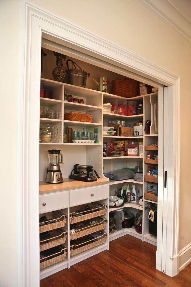 Inspiration for a traditional kitchen pantry in Boston with white cabinets and open cabinets.