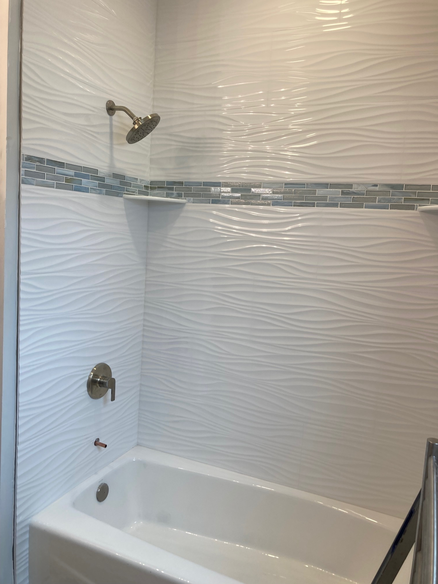 Hall Bath Remodel.  New tub / Tile