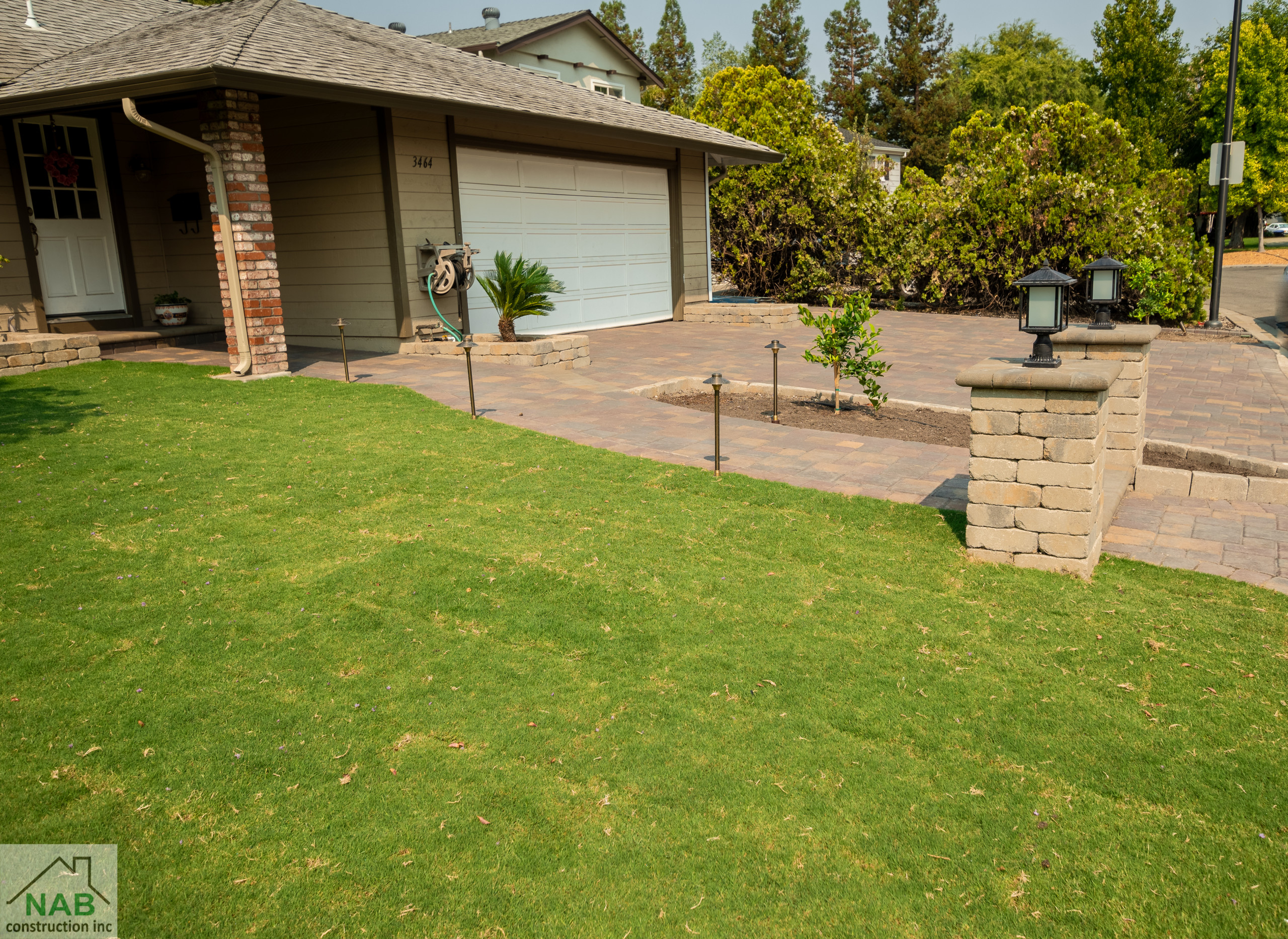 Pavers, lawn, pergola, and retaining wall installation in Pleasanton, CA