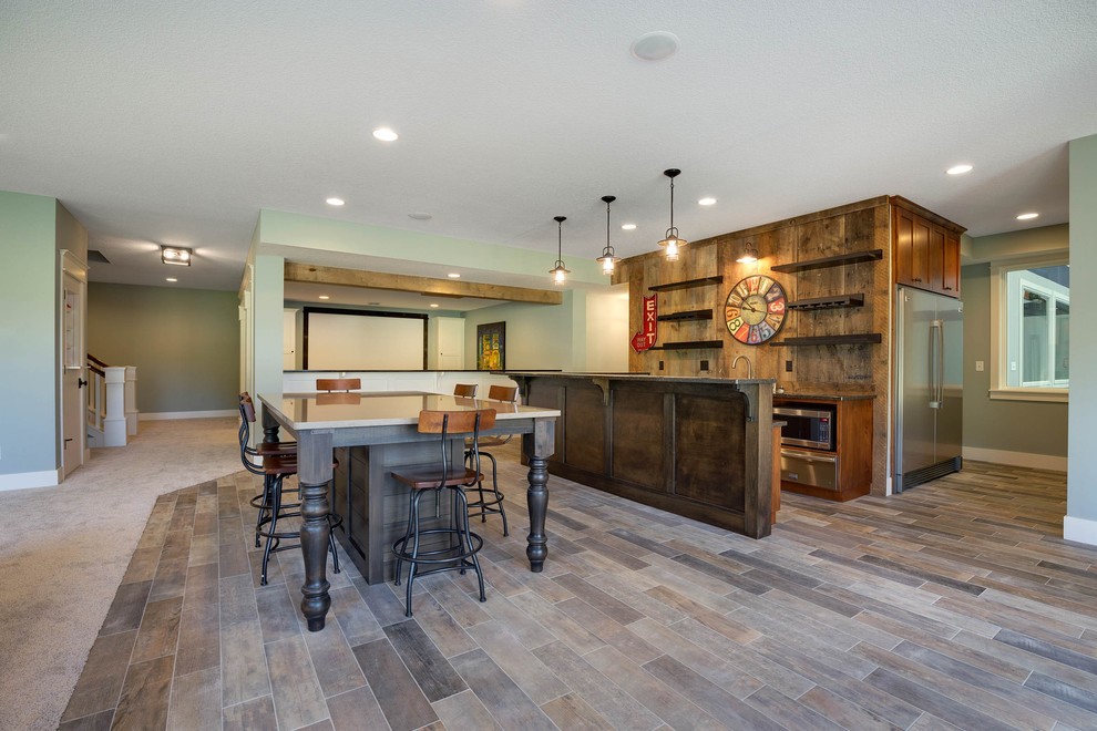This is an example of a country wet bar in Minneapolis with medium wood cabinets, marble benchtops and brown splashback.