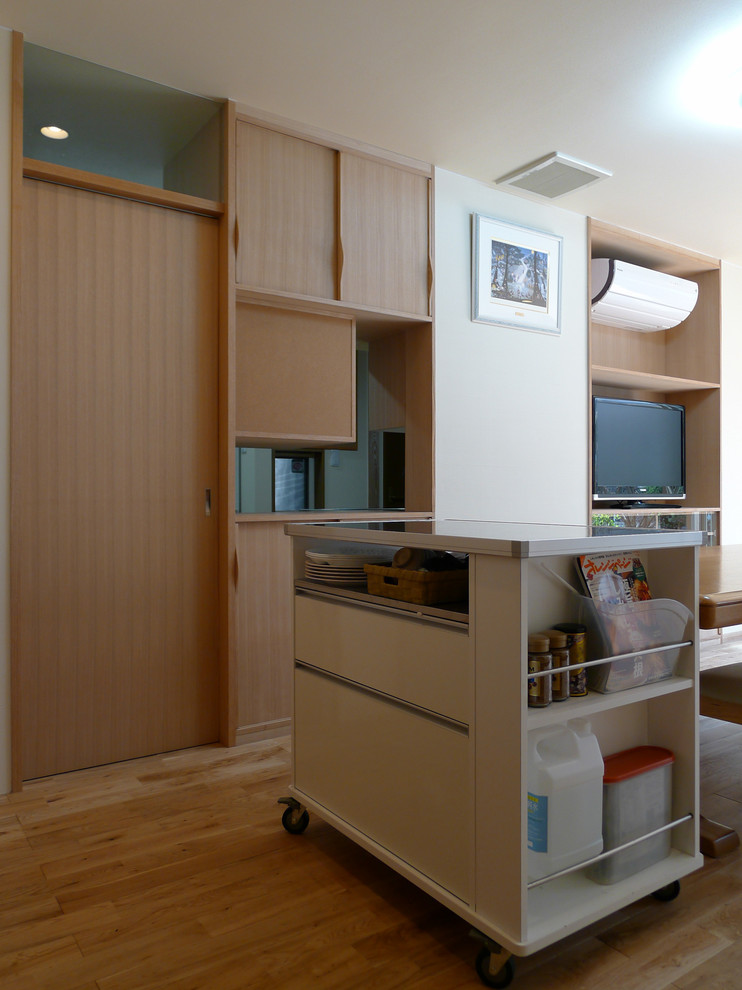 他の地域にある北欧スタイルのおしゃれなリビングの写真