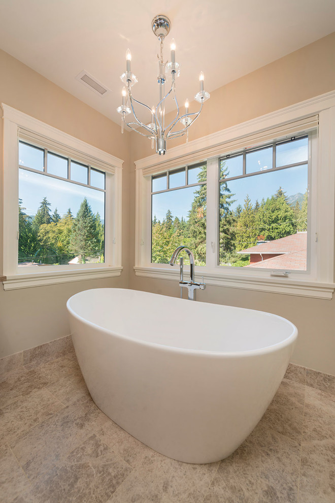 Photo of an expansive transitional master bathroom in Vancouver with beaded inset cabinets, dark wood cabinets, a freestanding tub, an open shower, beige walls, marble floors, a vessel sink, marble benchtops, multi-coloured floor, a hinged shower door and multi-coloured benchtops.