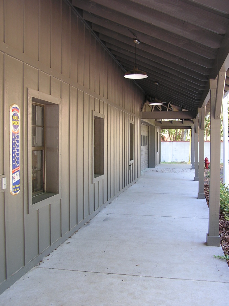 This is an example of a large country detached three-car workshop in Tampa.