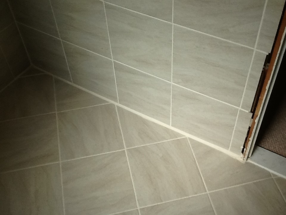 quarter round tile on tile at baseboard?