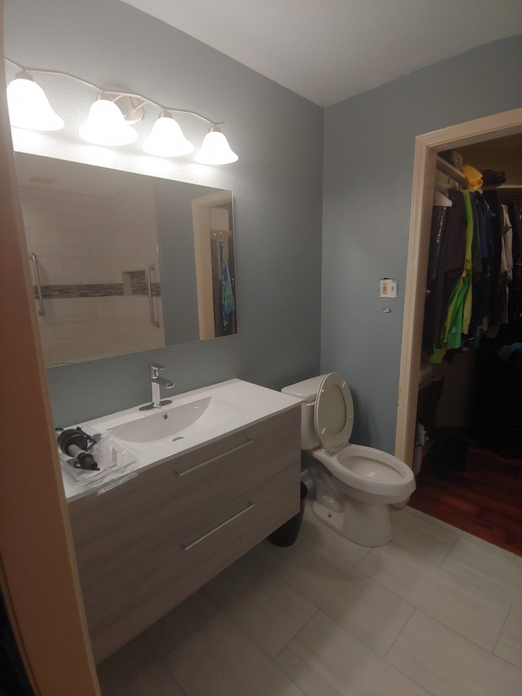 Handicap bathroom remodel and enlarge