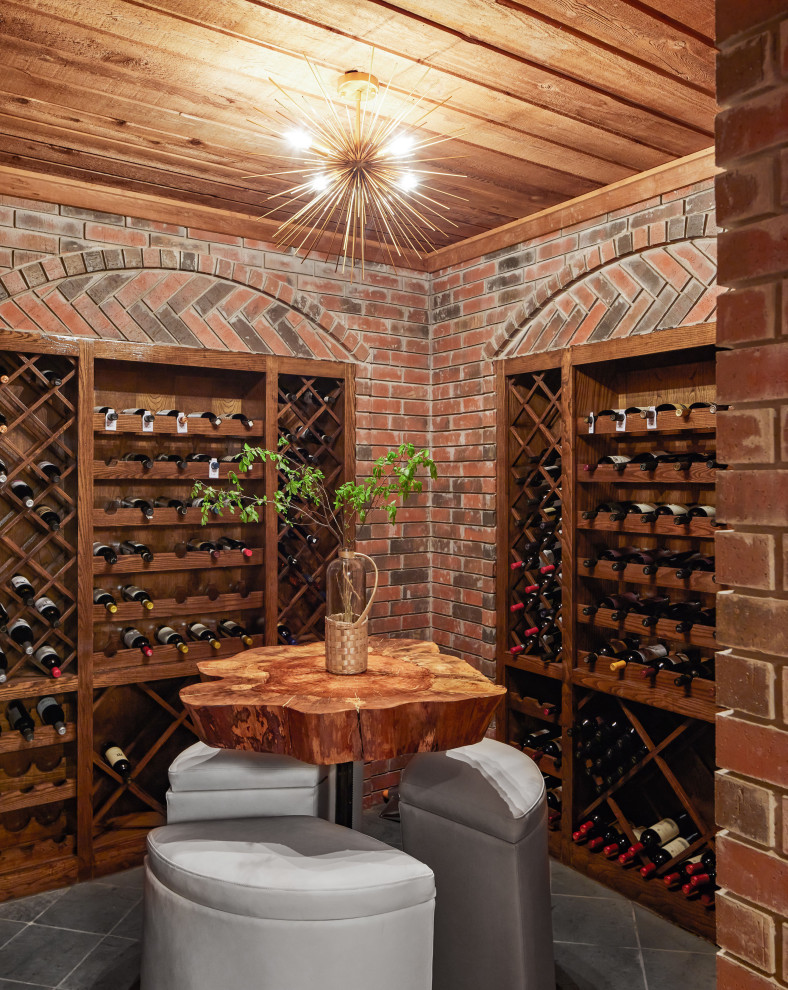 Example of a transitional wine cellar design in Dallas