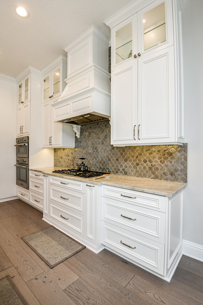 Example of a transitional kitchen design in Tampa