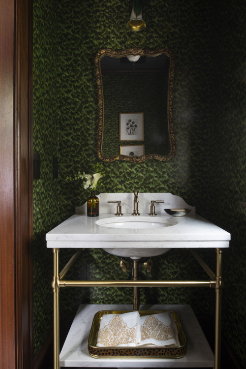 a small timeless wallpaper powder room remodel in Minneapolis with green walls and white countertops 