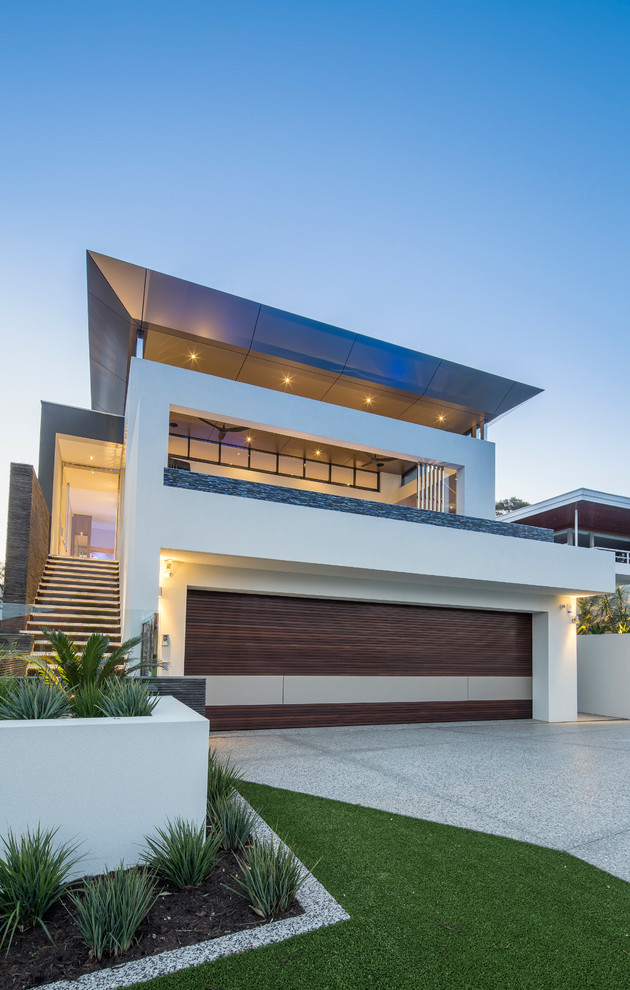 Large contemporary two-storey brick white exterior in Perth with a flat roof.