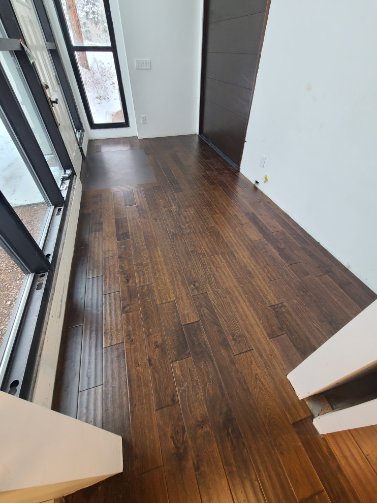 Sleek Engineered Hardwood & Modern Sliding Door by I’m The Man Services