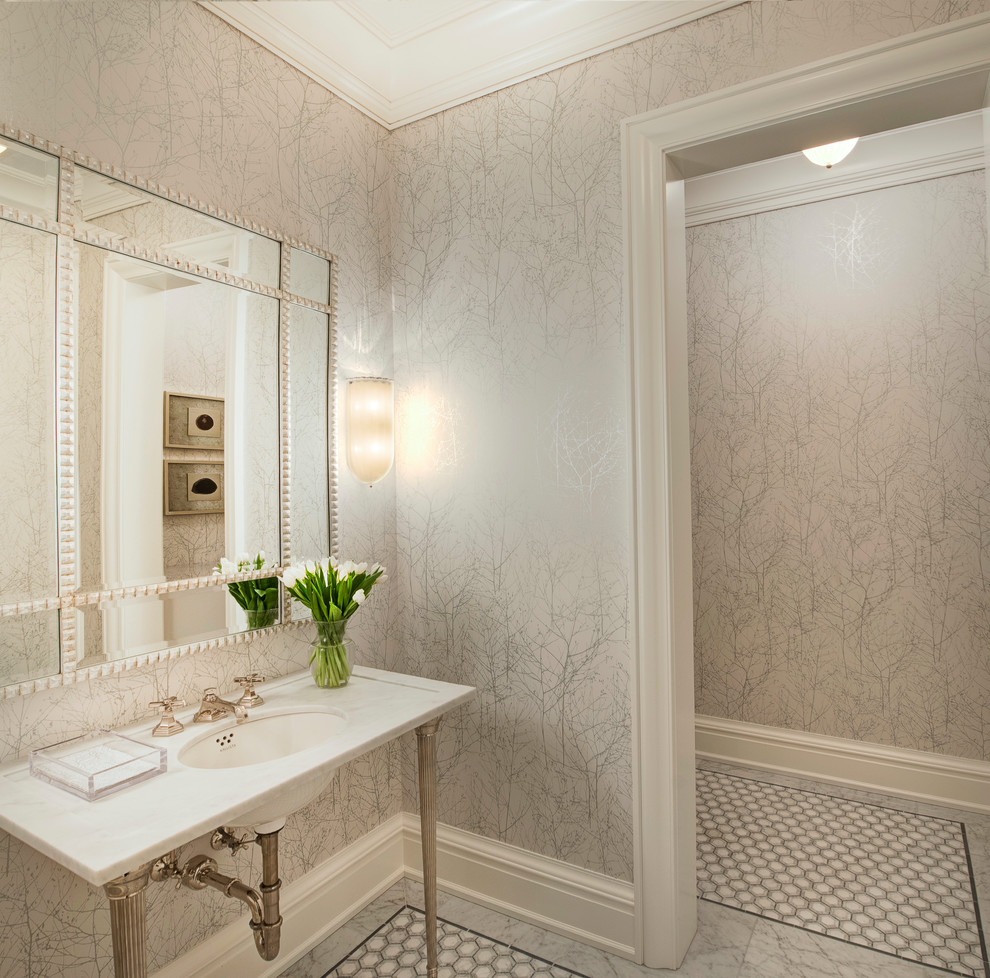 Inspiration for a mid-sized transitional mosaic tile floor and multicolored floor powder room remodel with gray walls, an undermount sink and marble countertops