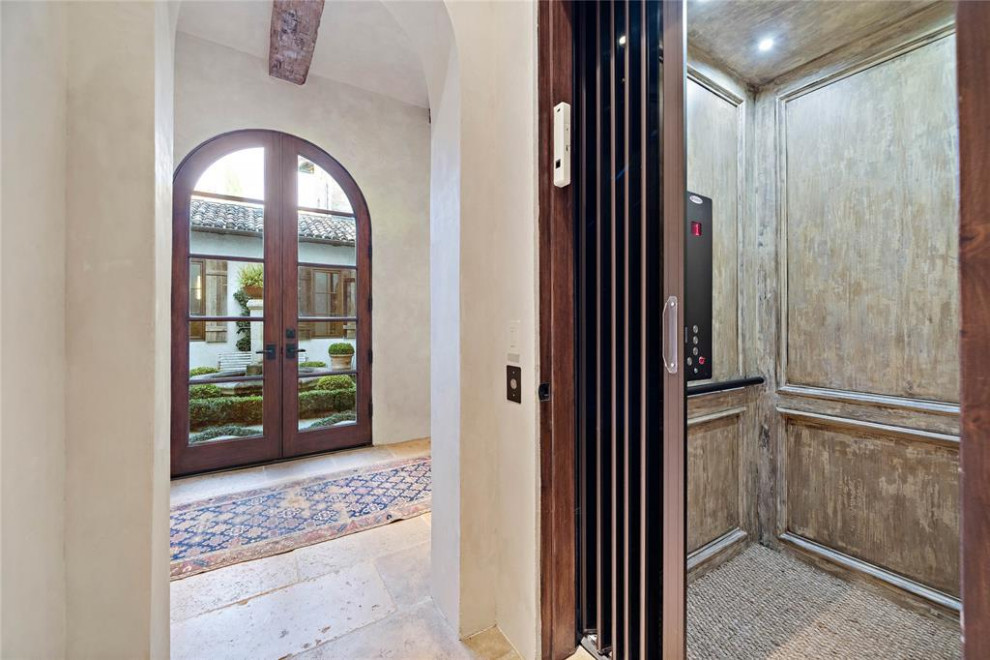 This is an example of a mediterranean hallway in Houston.
