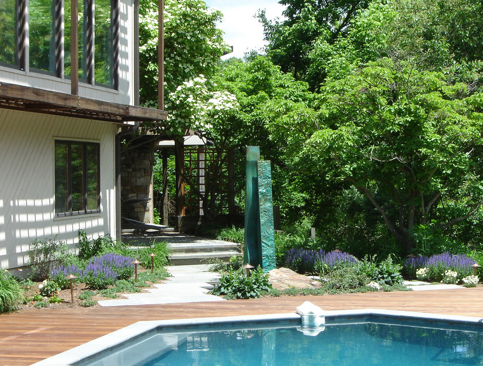 This is an example of a contemporary backyard garden in Baltimore with decking.