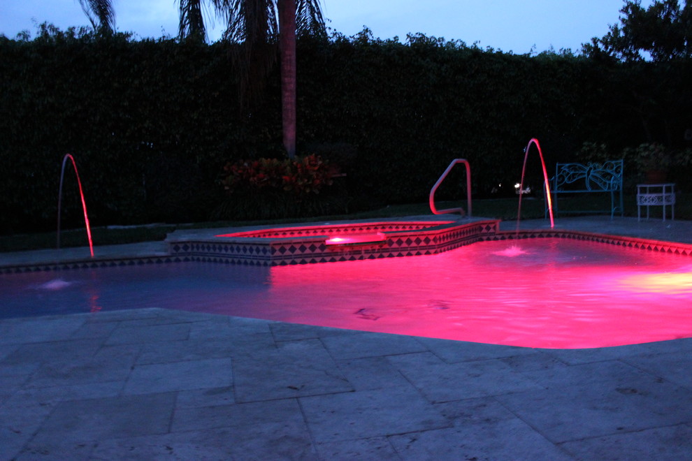 Inspiration for a transitional pool remodel in Miami