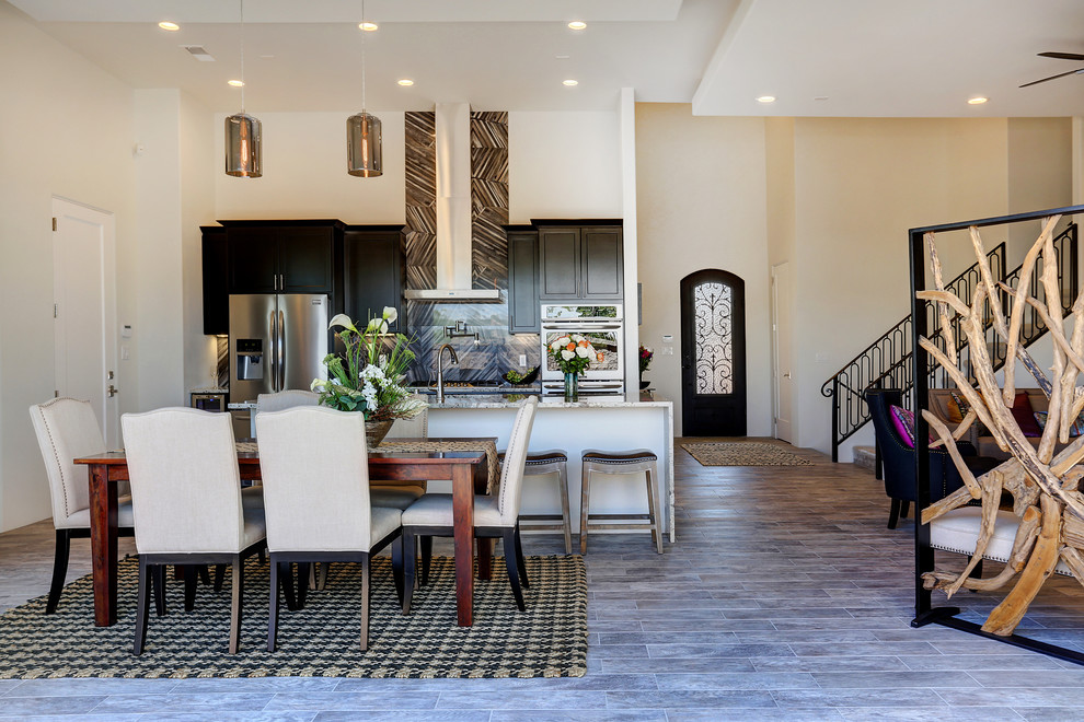 Mid-sized trendy porcelain tile kitchen/dining room combo photo in Albuquerque