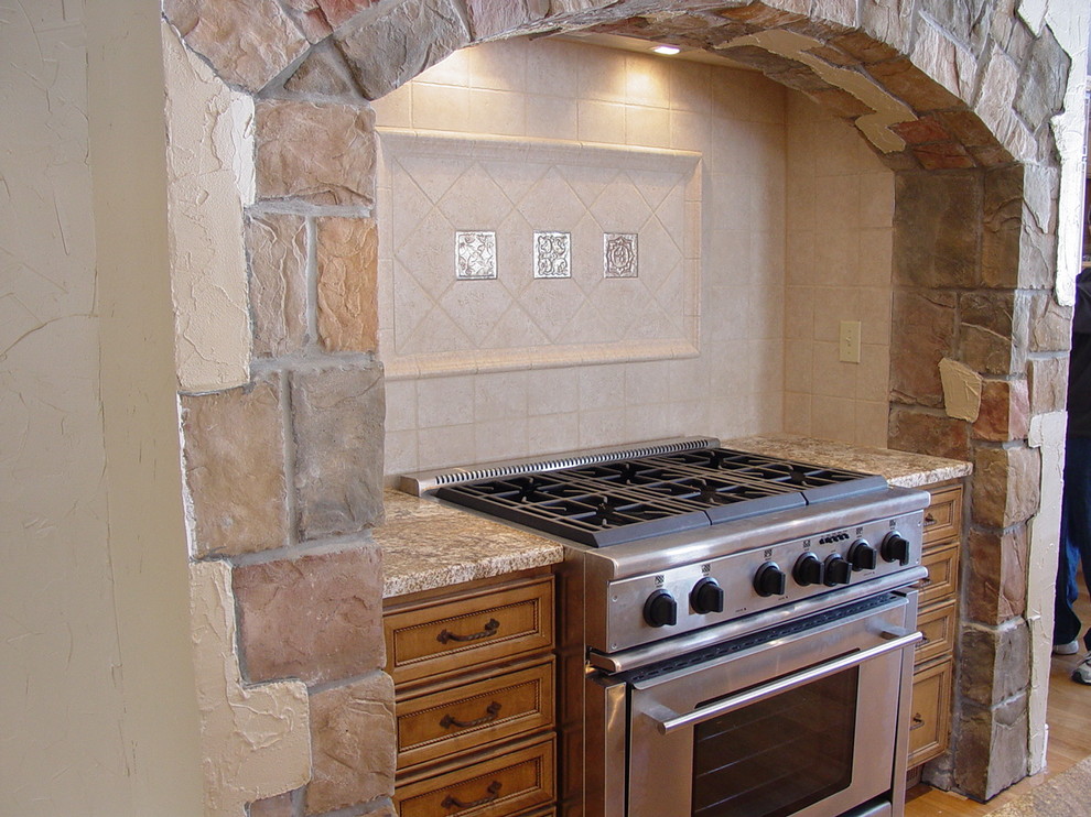 This is an example of a mediterranean kitchen in Cleveland.