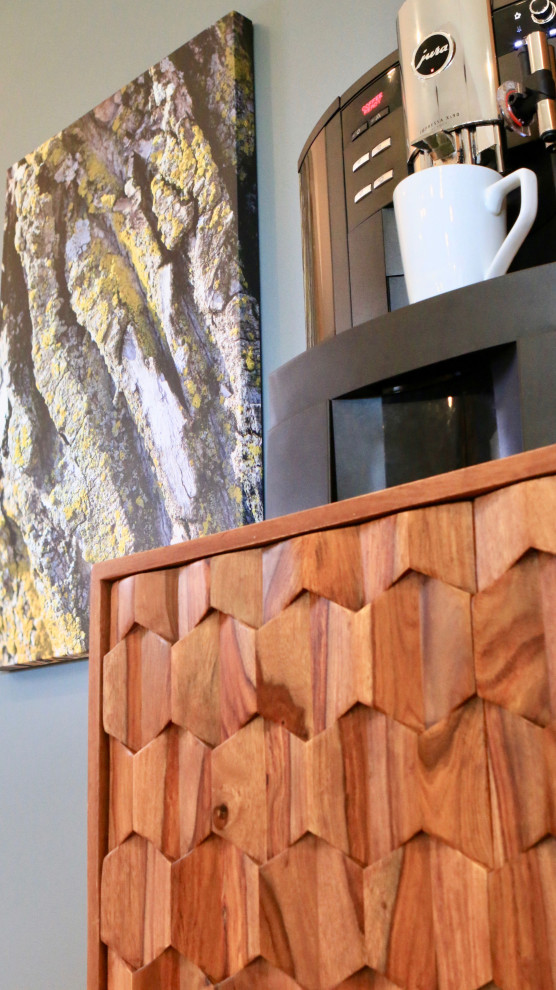 Example of a mid-sized transitional light wood floor and beige floor kitchen design in Omaha