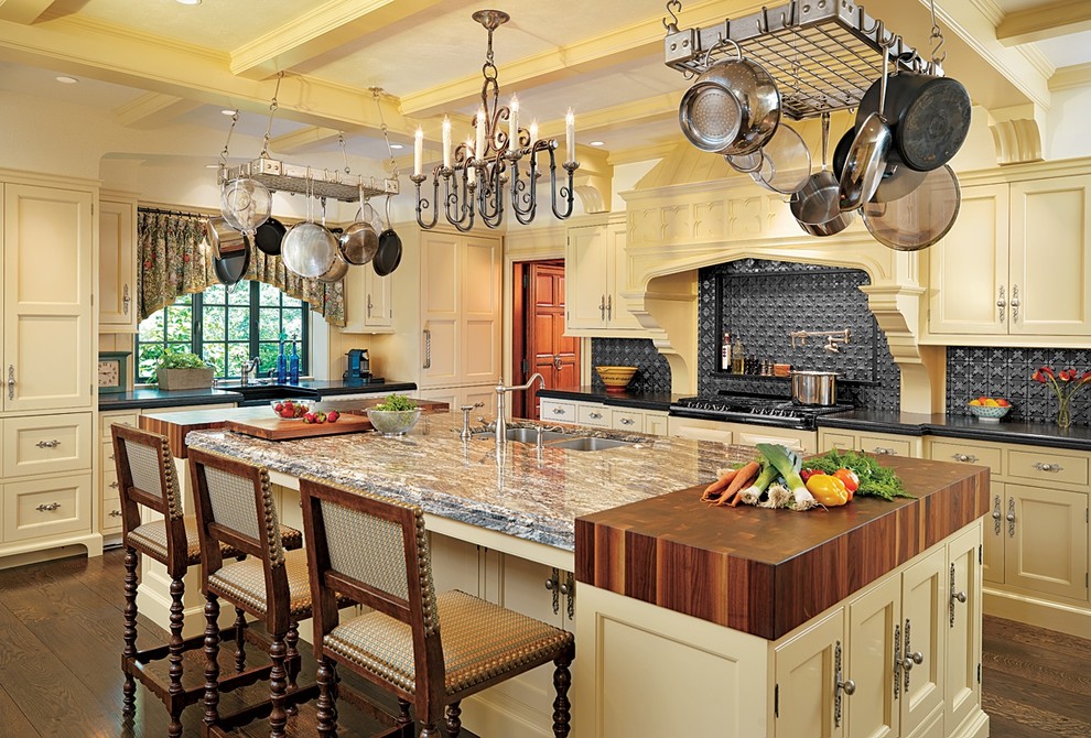 Design ideas for a traditional kitchen in Boston with wood benchtops.
