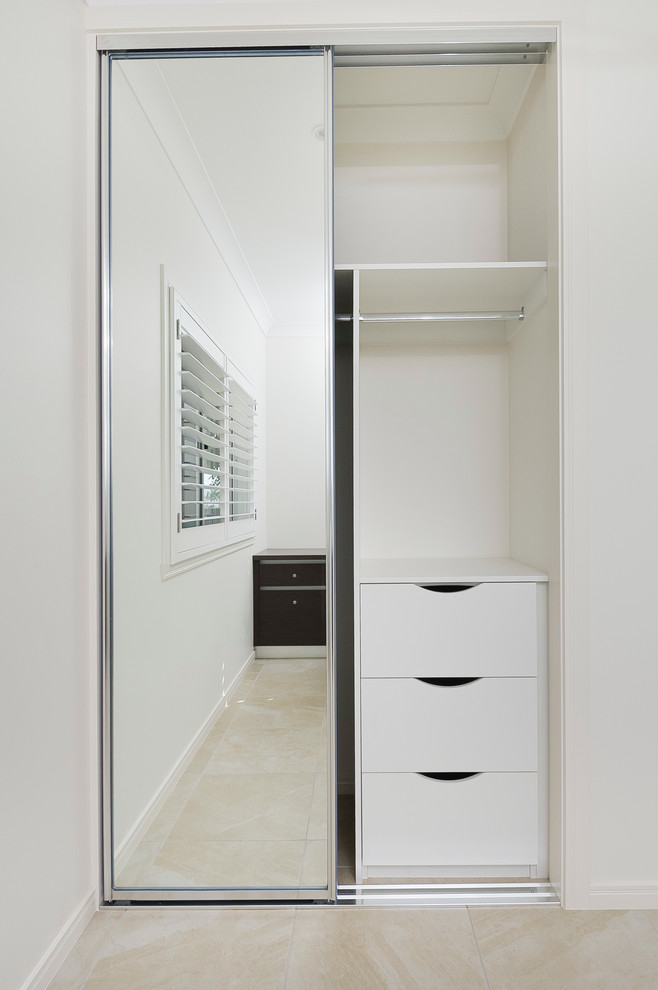 This is an example of a modern storage and wardrobe in Cairns.