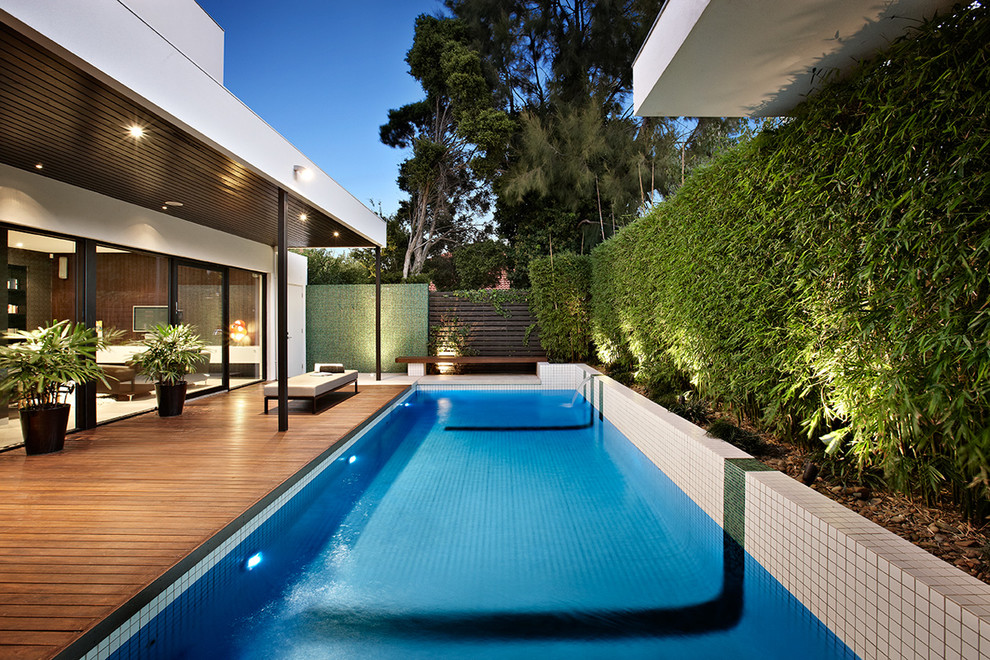 Inspiration for a contemporary pool in Melbourne with decking.