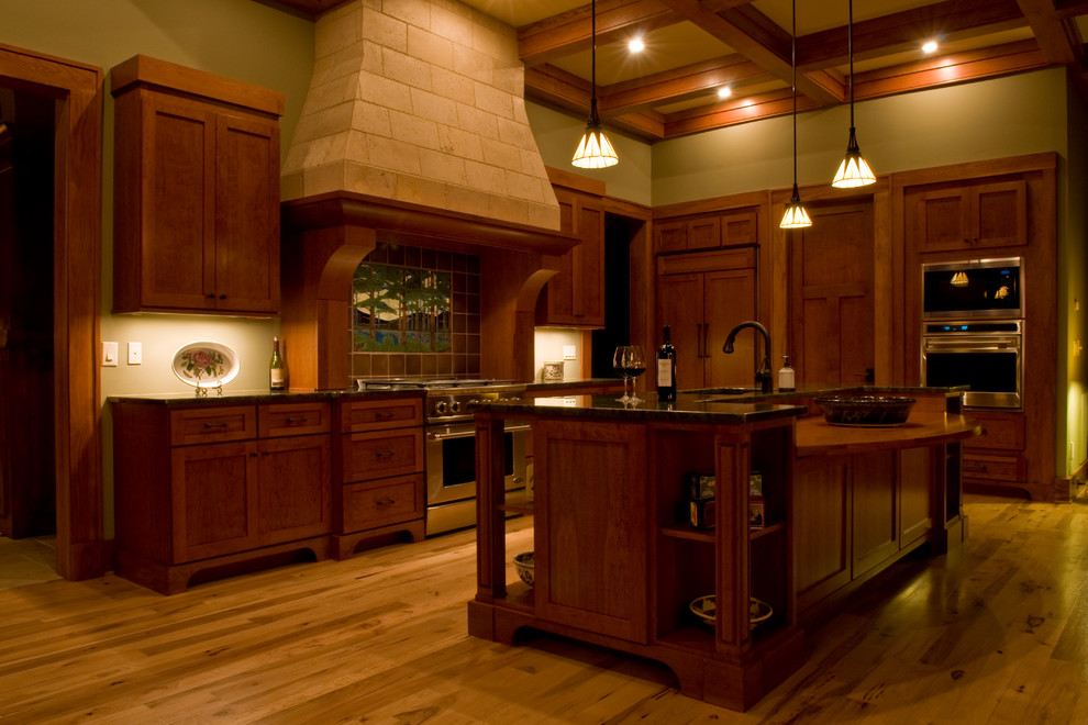 Photo of an arts and crafts kitchen in Other.
