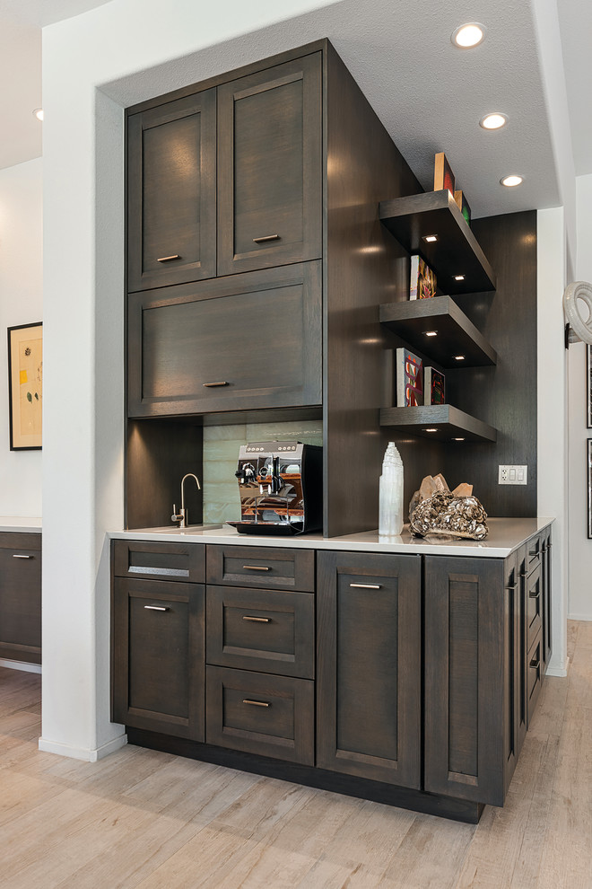 Example of a transitional kitchen design in Seattle with shaker cabinets and dark wood cabinets