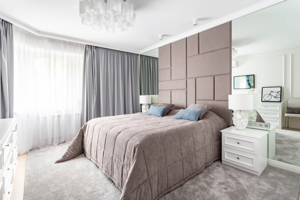 Transitional bedroom in Moscow with white walls, light hardwood floors and beige floor.