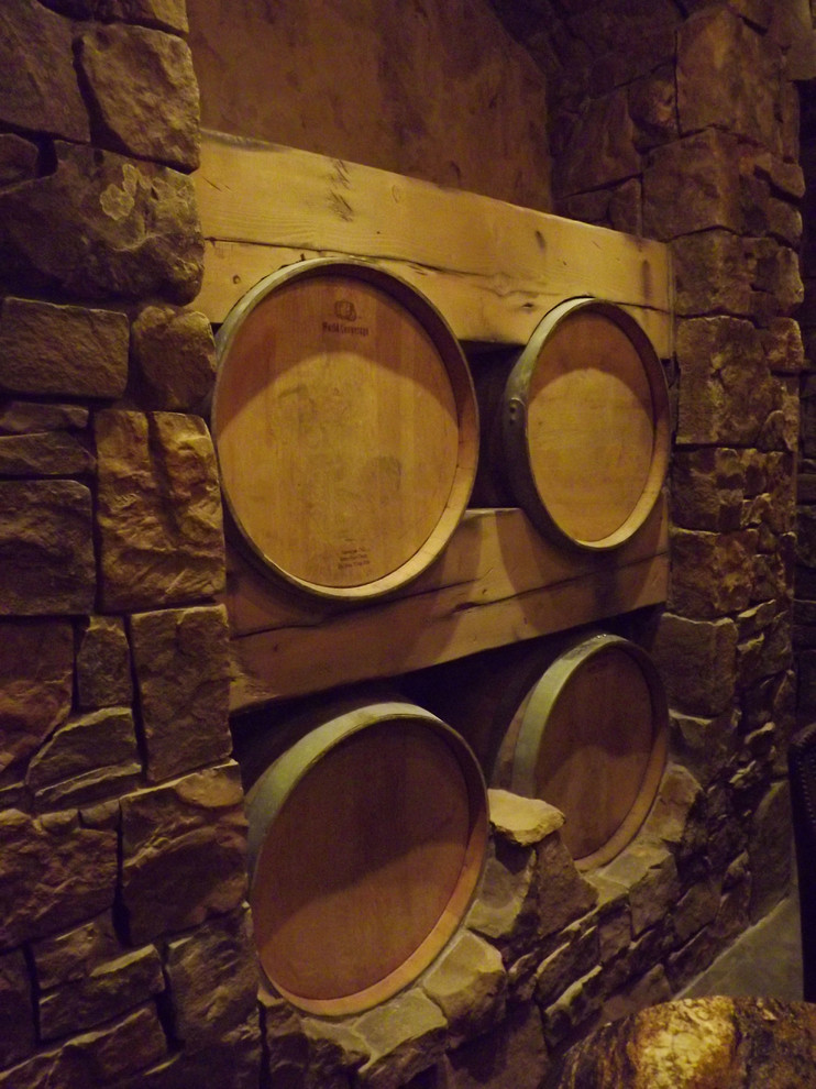 Example of a mountain style wine cellar design in Seattle