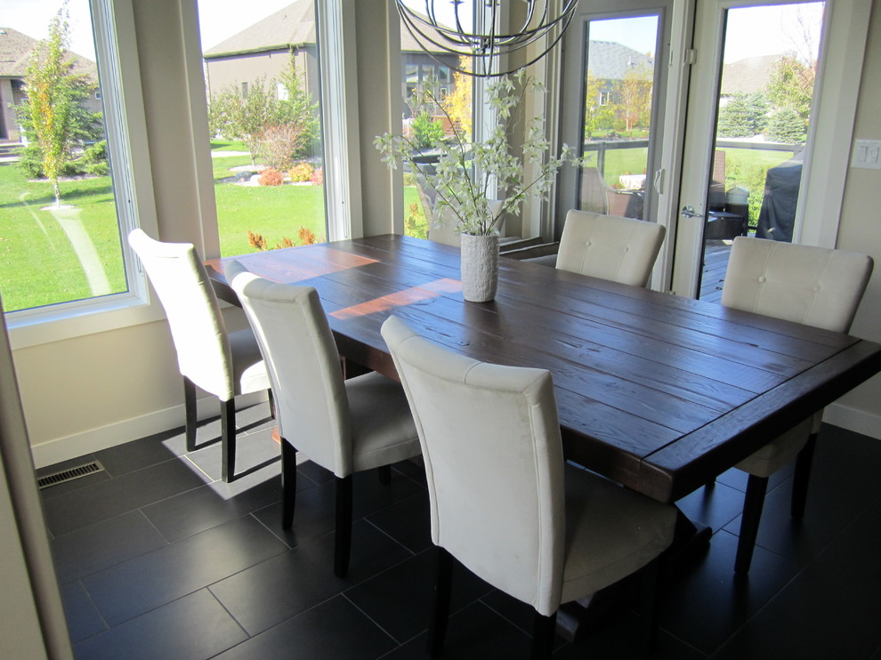 Example of a mountain style dining room design in Vancouver