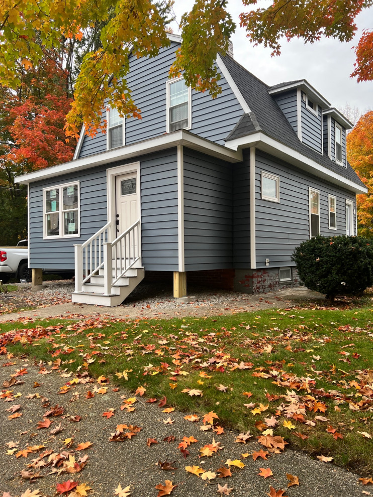 Four season room and vinyl siding