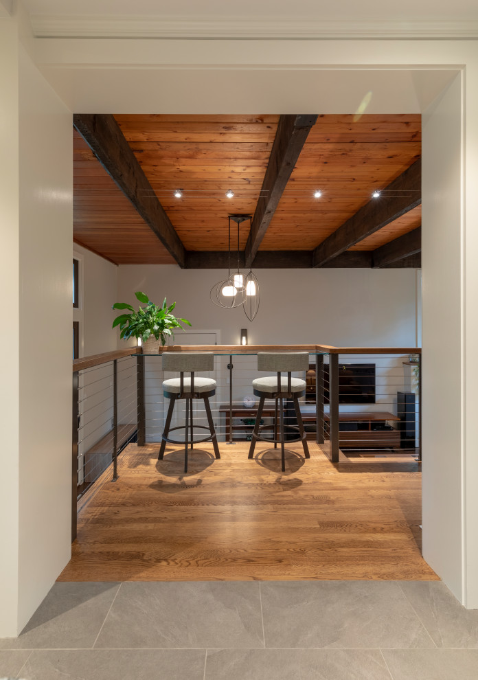 Example of a transitional kitchen design in Boston with blue backsplash
