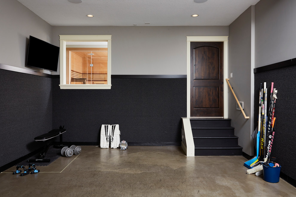 Design ideas for a mid-sized transitional multipurpose gym in Minneapolis with multi-coloured walls, concrete floors and grey floor.