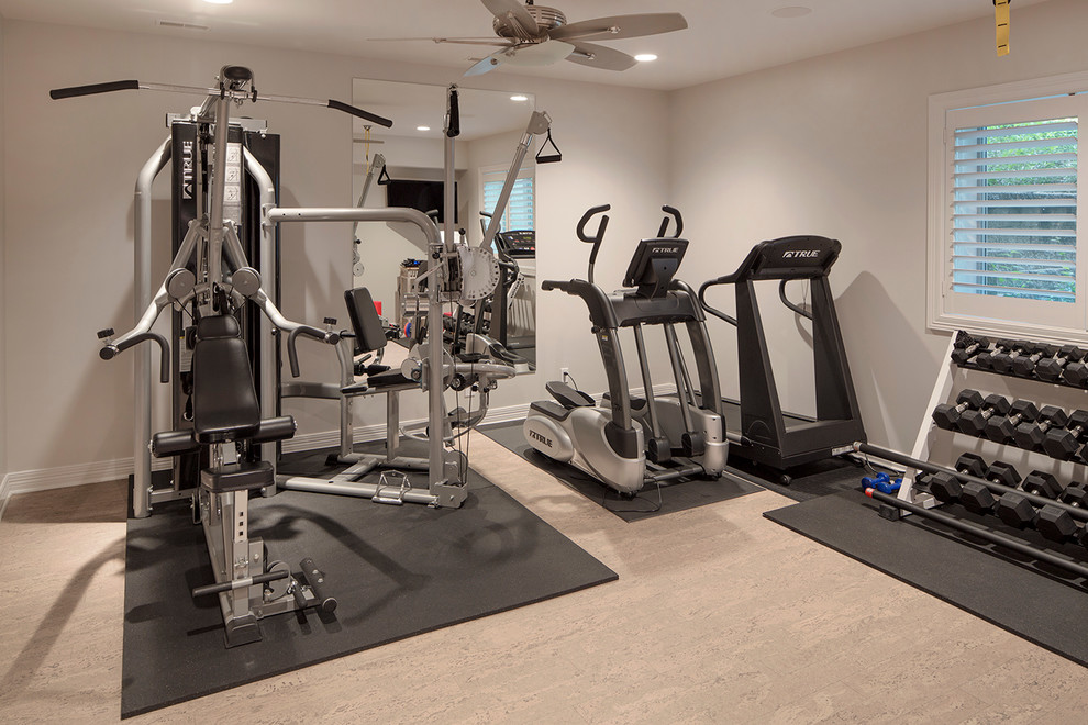 Photo of a contemporary home gym in Omaha.