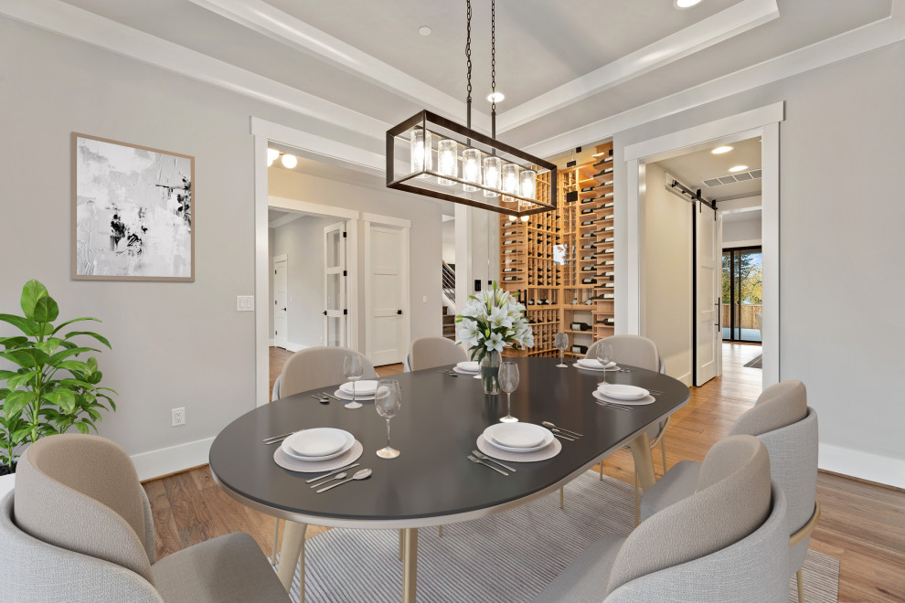 Large classic enclosed dining room in Seattle with grey walls, medium hardwood flooring, brown floors and a drop ceiling.