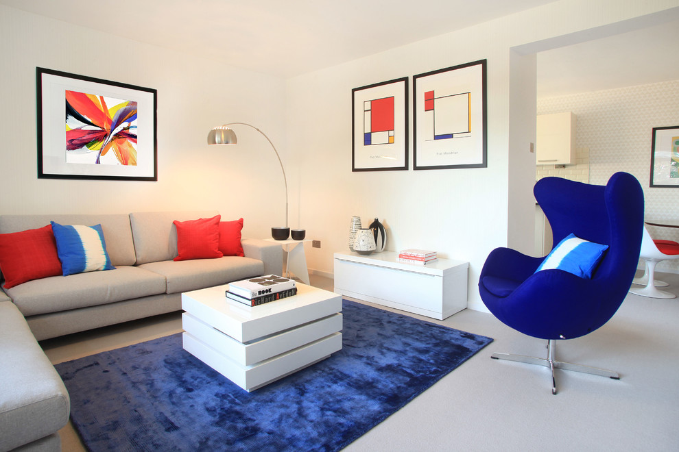 Inspiration for a mid-sized modern formal living room in London with white walls.