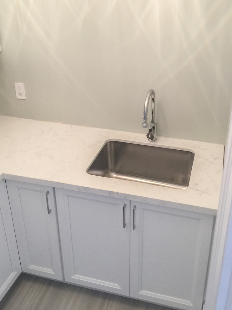 Laundry room - transitional laundry room idea in Toronto