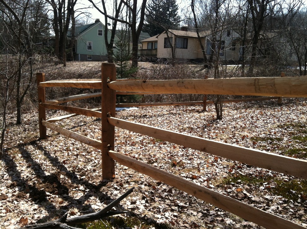 Example of a mountain style home design design in Boston