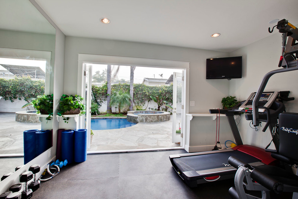 This is an example of a traditional multipurpose gym in Los Angeles with grey walls.