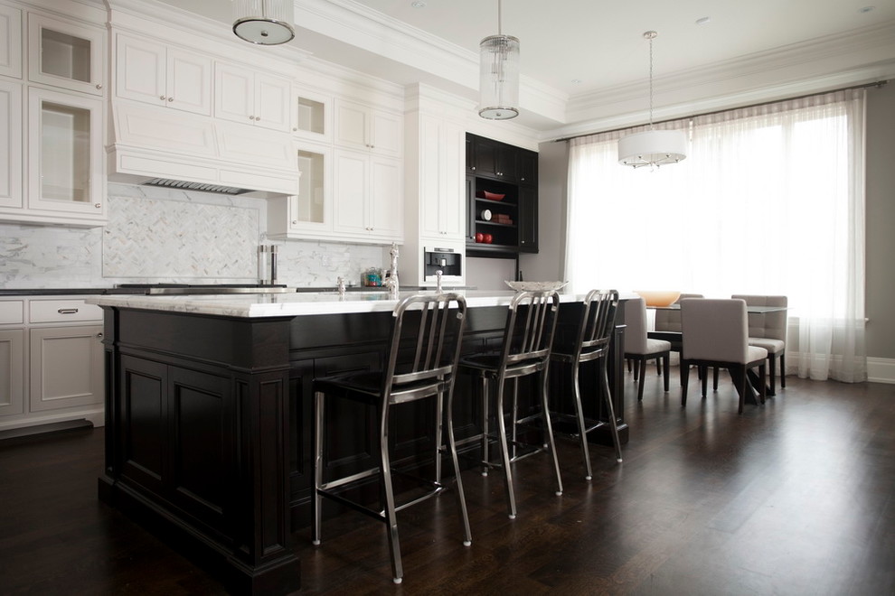 Inspiration for a modern eat-in kitchen in Toronto with marble benchtops.