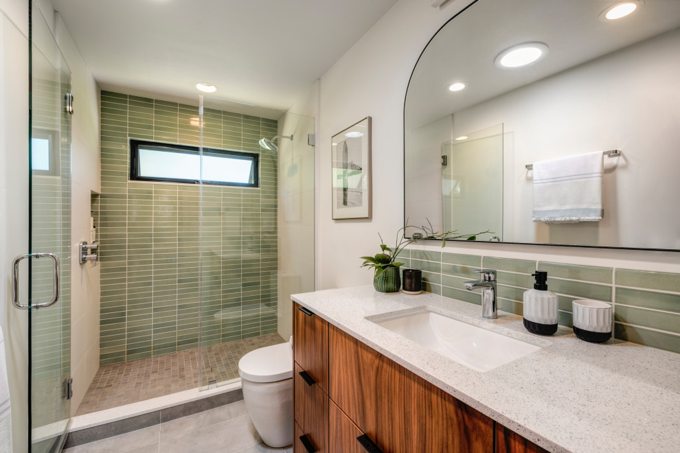 Serene Bathroom with Low Curb Shower and Green Heath Ceramic Tile