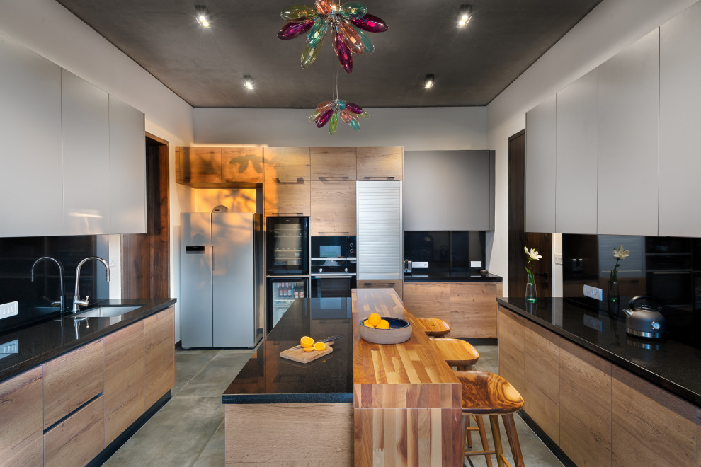 This is an example of a contemporary kitchen in Bengaluru.