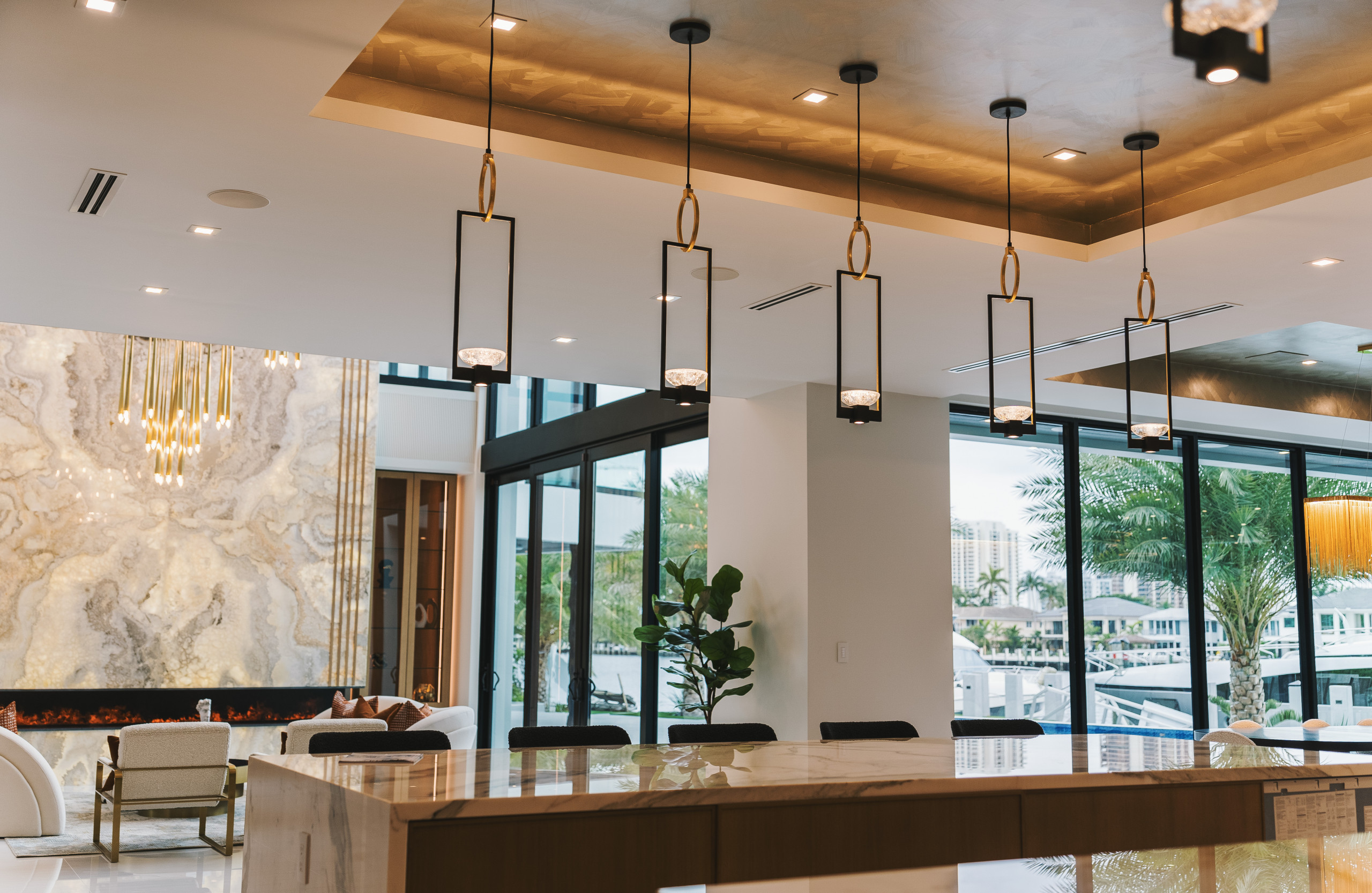 Elevated Dining Experience: Kitchen Island Pendants and Tray Ceiling Finish