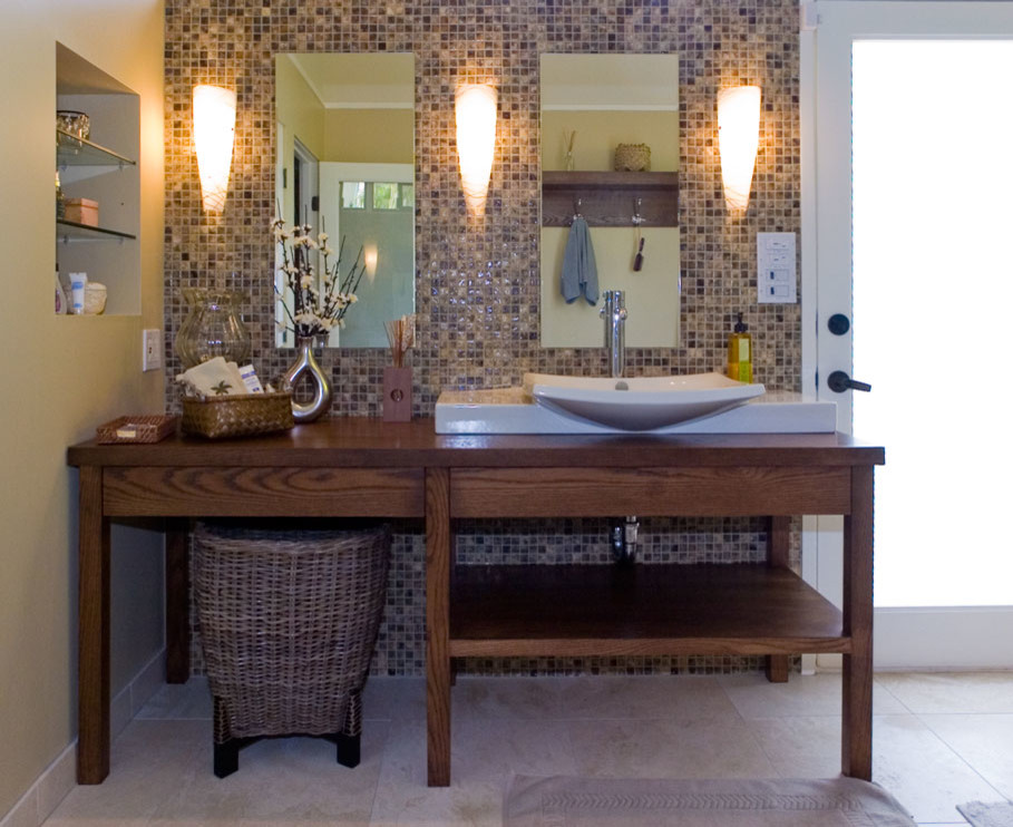 Photo of a mid-sized contemporary bathroom in Hawaii with open cabinets, medium wood cabinets, brown tile, mosaic tile, yellow walls, a vessel sink and wood benchtops.