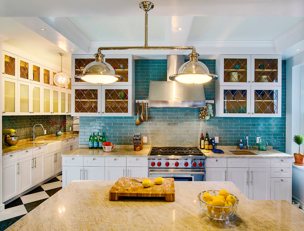 Inspiration for a traditional kitchen in New York with recessed-panel cabinets and with island.